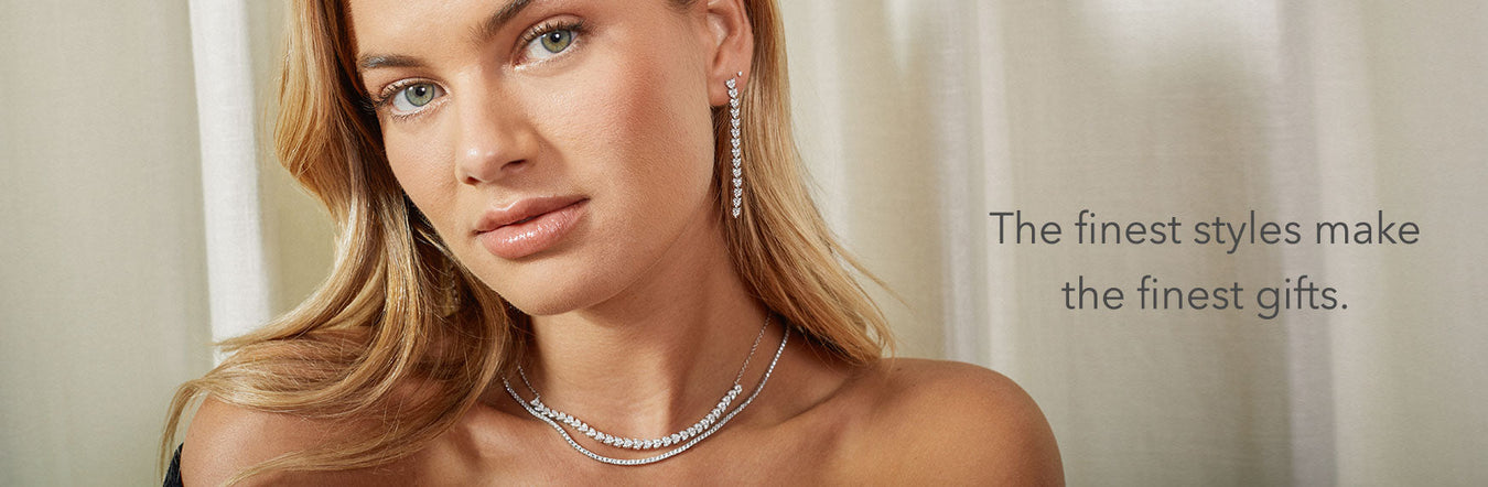 EF Collection Curated Page with Luxe Gifts - Photo Featuring Model and 14k White Gold Earrings and Necklaces Styled on Neck and Ears