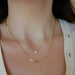 Full Cut Diamond Disc Choker Necklace styled on neck of model with gold chain necklace