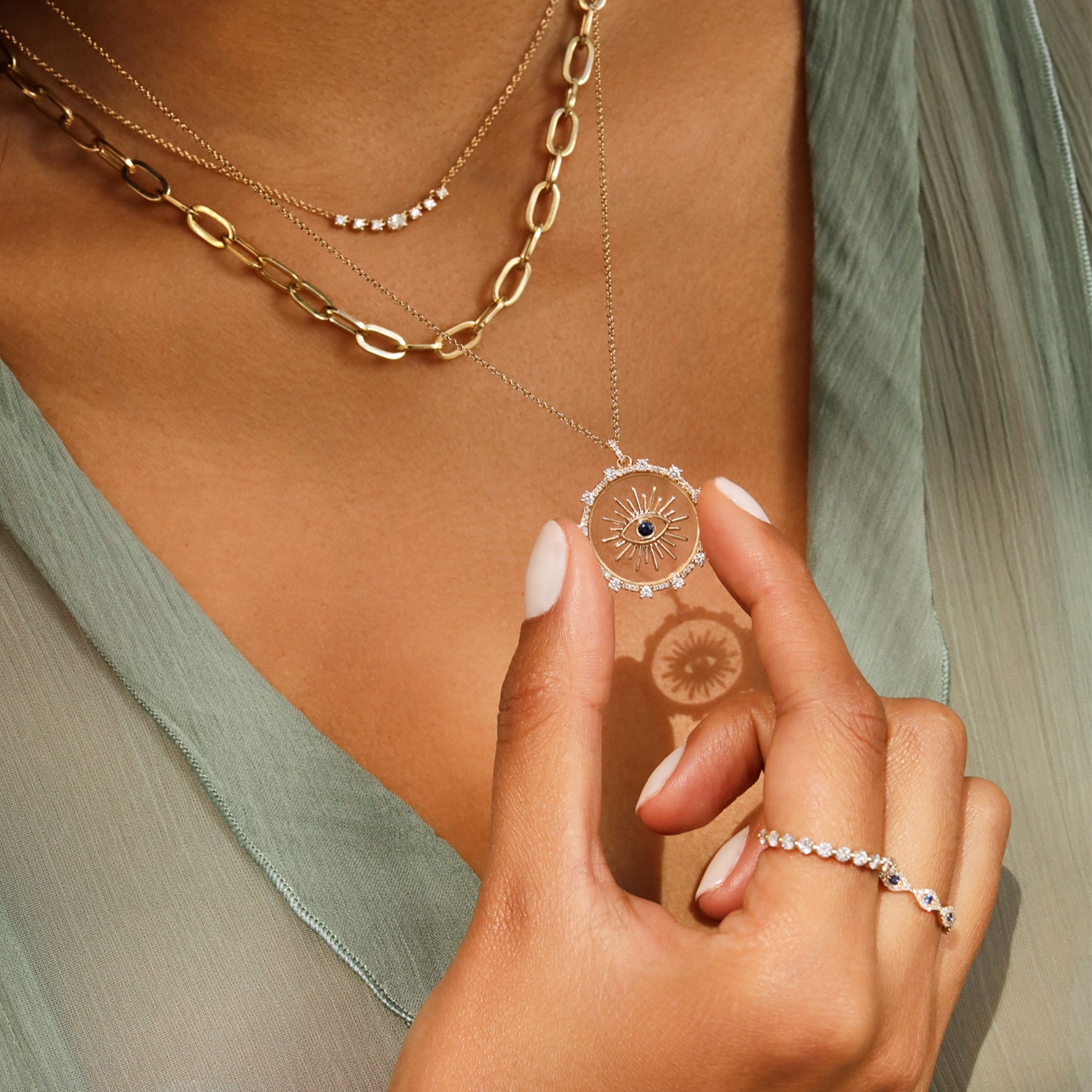 EF Collection 14k yellow gold necklaces and rings styled on model