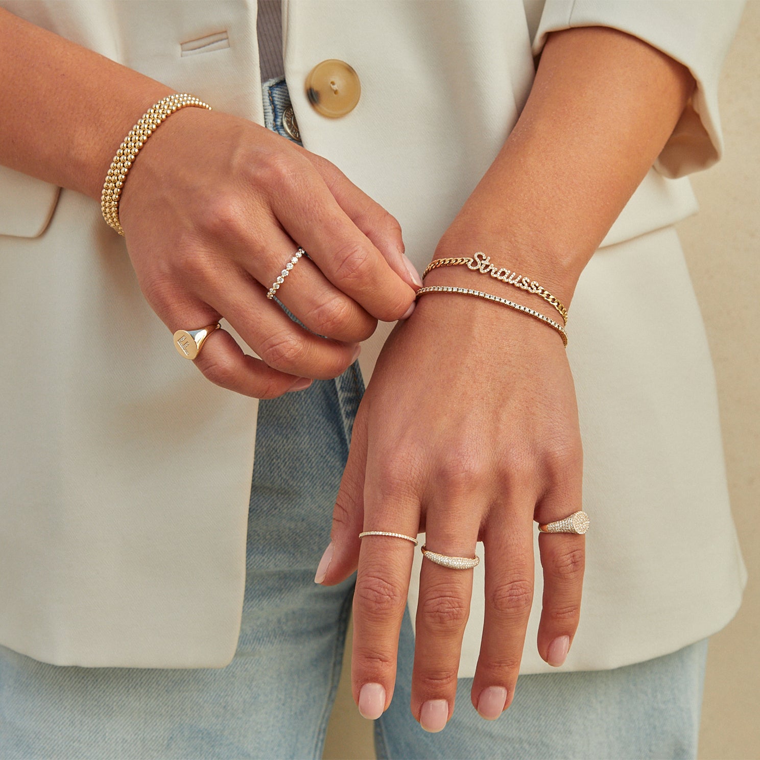 EF Collection 14k yellow gold rings and bracelets with diamonds styled on model