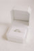 Emerald Cut Diamond Eternity Band in platinum setting inside white ring box