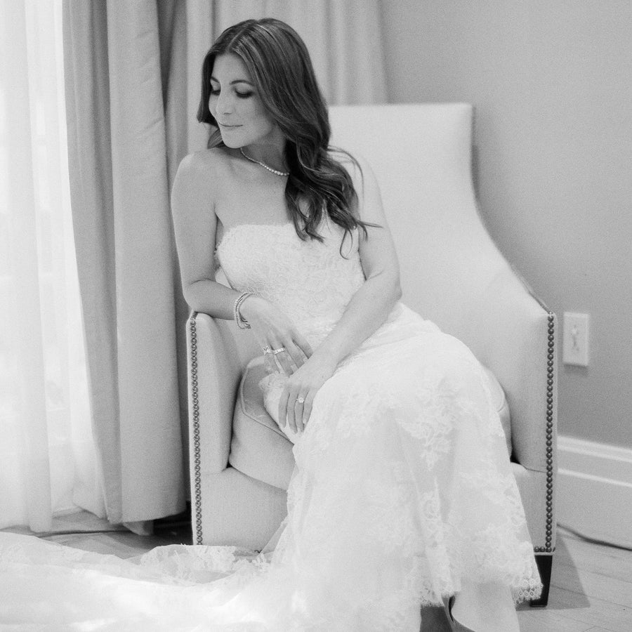 EF Collection bespoke diamond jewelry styled on model in white dress