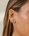 Jumbo Prong Set Diamond Mini Huggie Earrings in 4k Yellow Gold