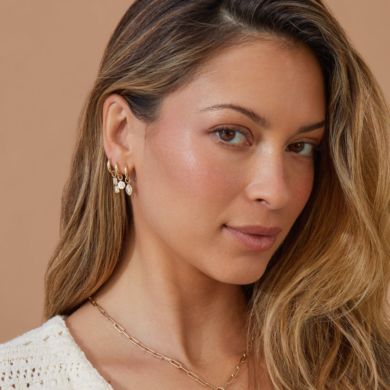 Gold Frame Round Diamond Huggie Charm on Gold Dome Huggie Earring
