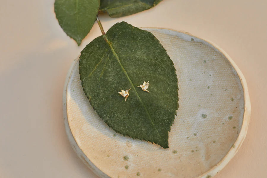 EF Collection 14k yellow gold hummingbird stud earrings with diamond eyes on green leaf