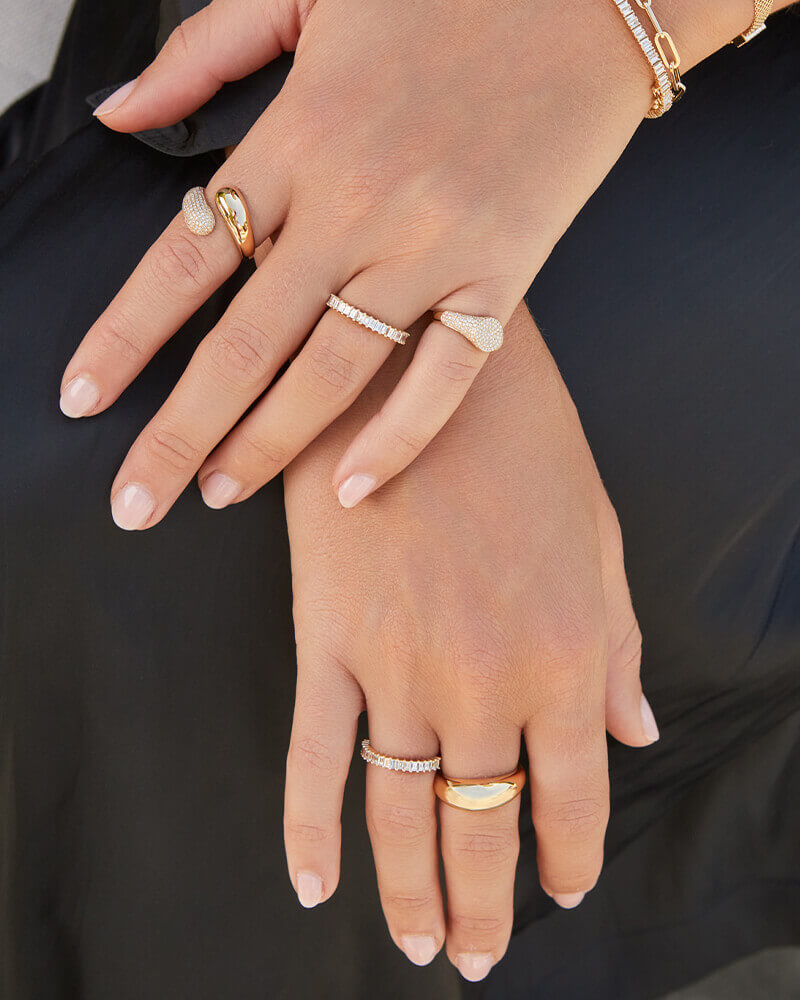 EF Collection 14k yellow gold rings with diamonds styled on fingers of model
