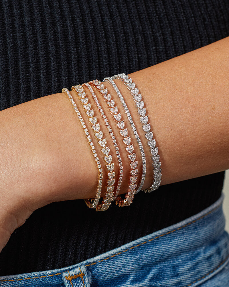 EF Collection 14k yellow gold, rose gold, and white gold tennis bracelets with diamonds styled on wrist of model