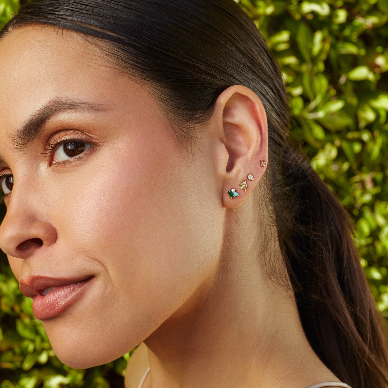 EF Collection 14k yellow gold earring styled on ear lobe of model