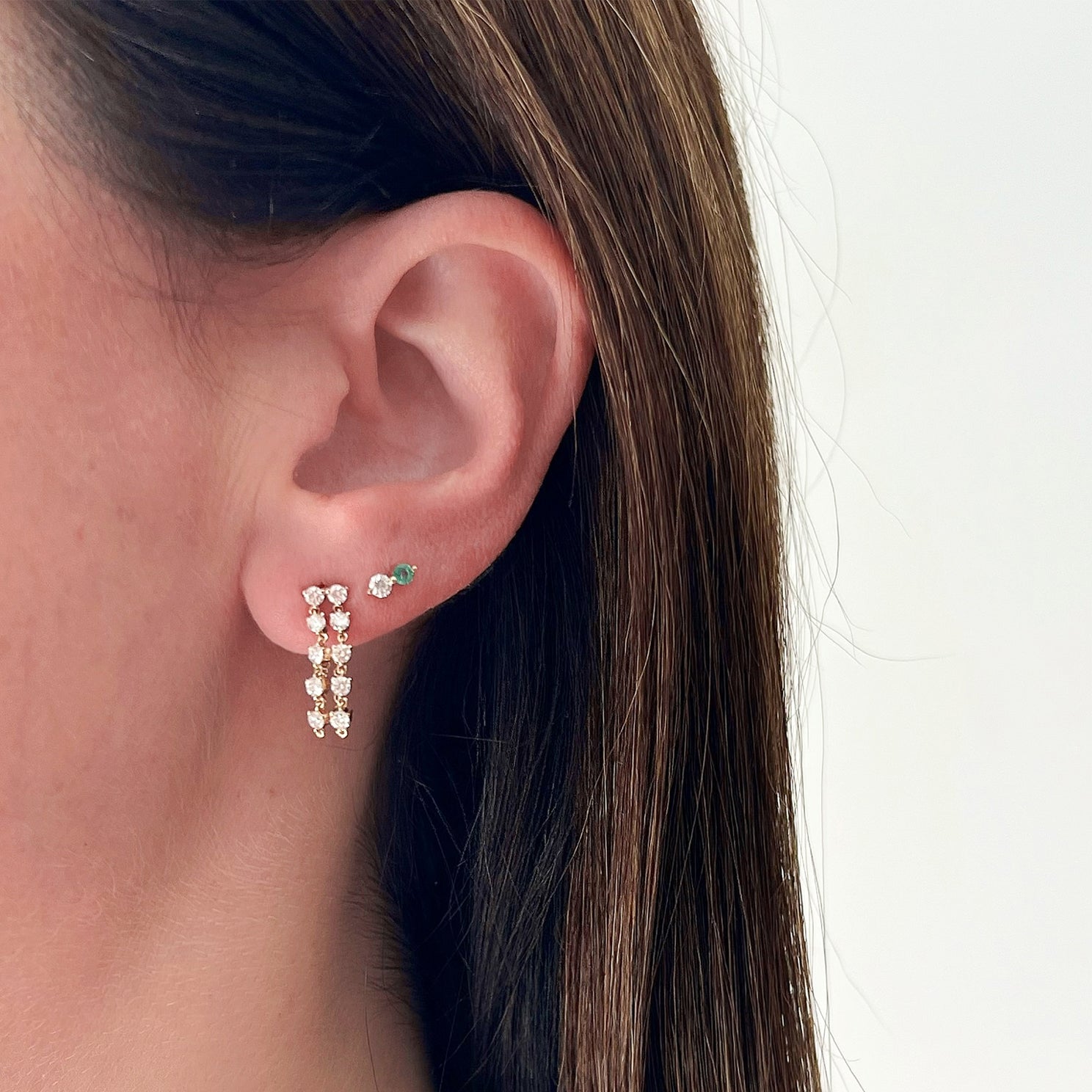 Double Multi Diamond Chain Stud Earring in 14k yellow gold styled on first earring hole of model