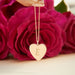 Gold Jumbo Heart Necklace in 14k yellow gold engraved with initial E next to red roses