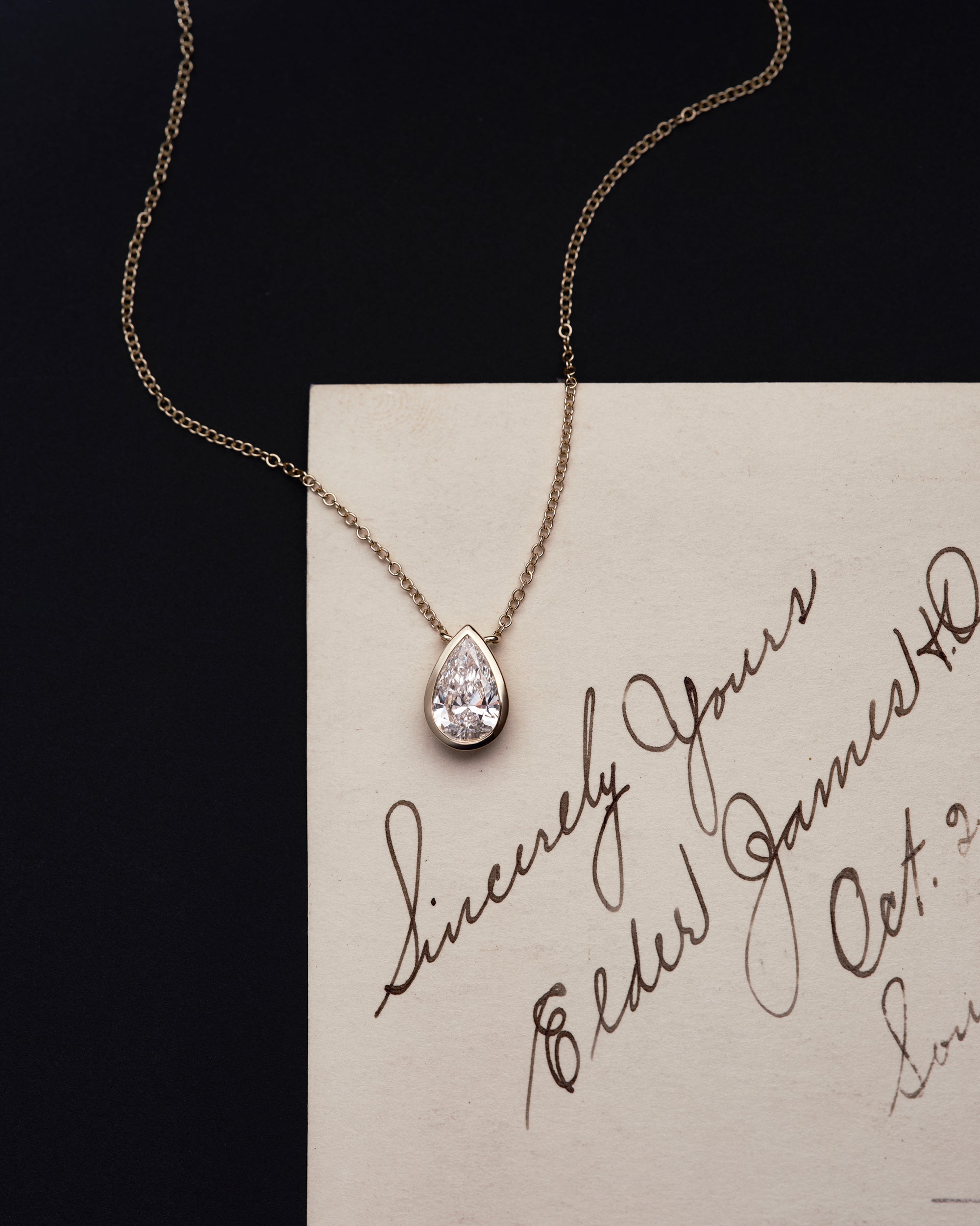 Floating Bezel Set Pear Diamond Necklace