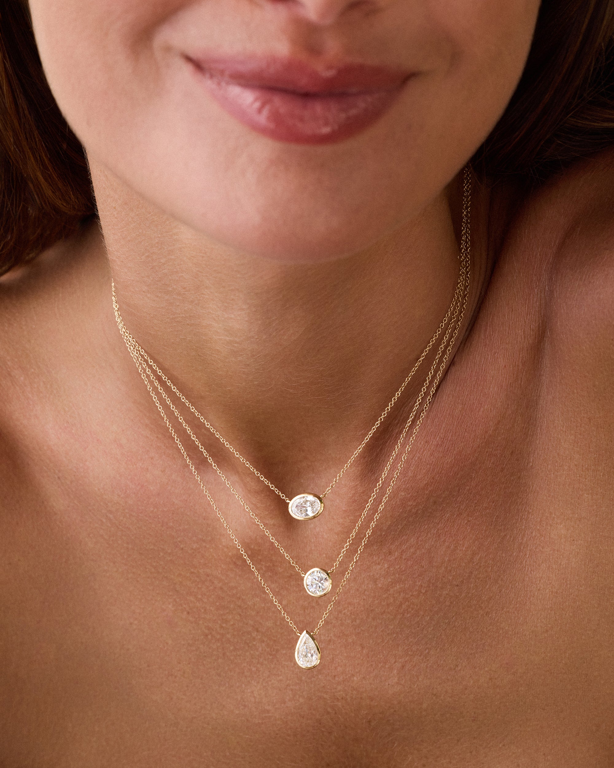 Floating Bezel Set Oval Diamond Necklace