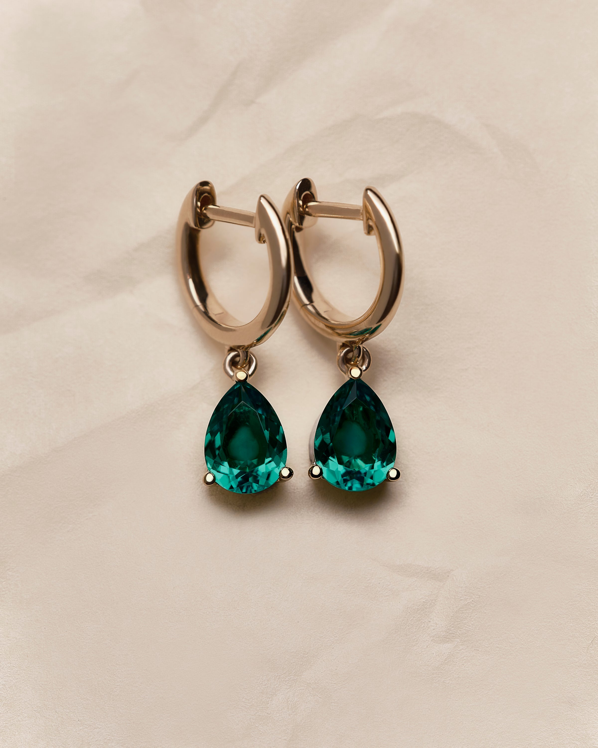 Emerald Pear Drop Huggie Earrings