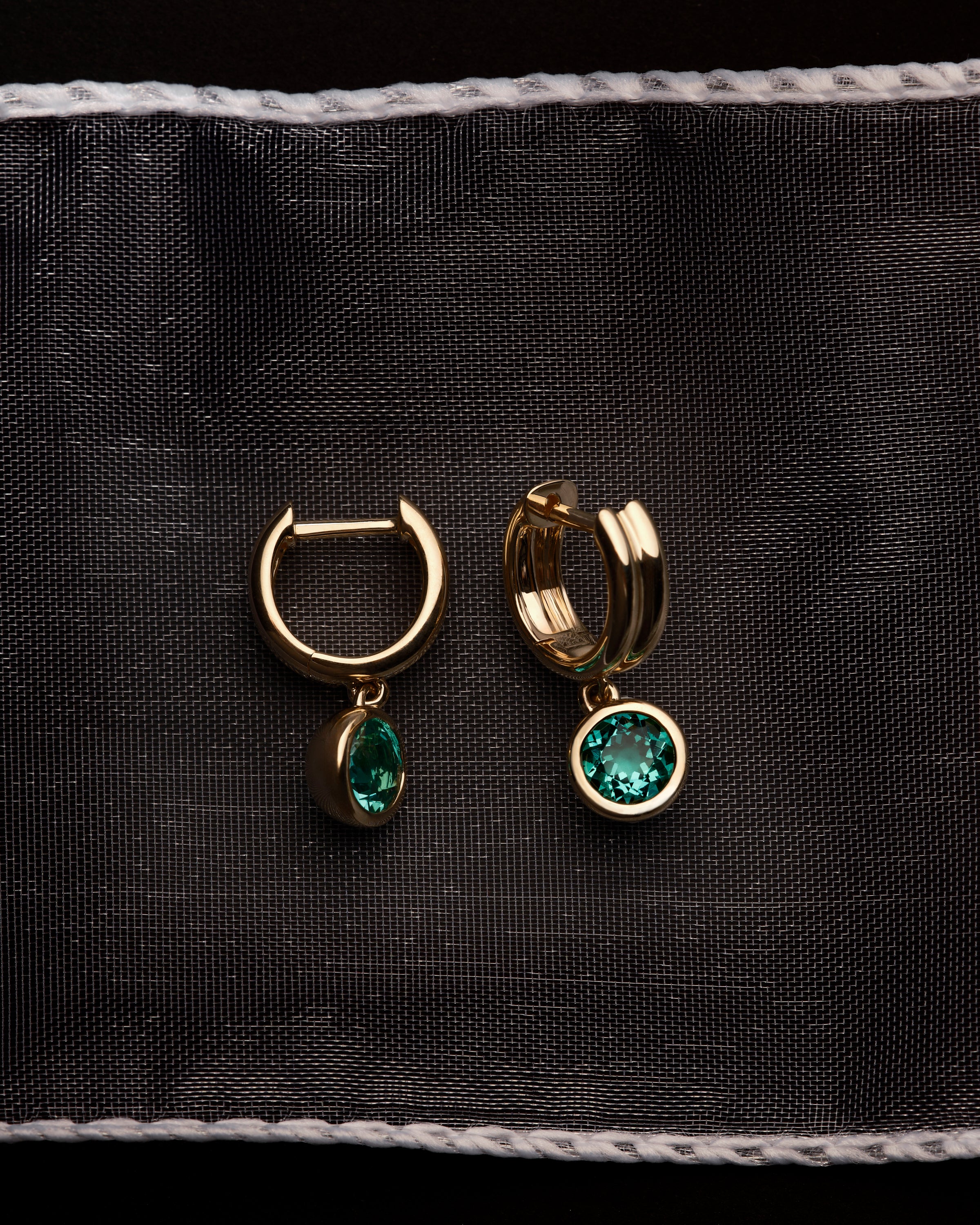 Bezel Set Round Emerald Drop Huggie Earrings