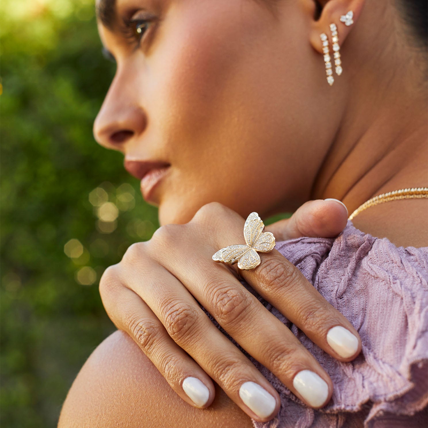 Pavé Diamond Jumbo Butterfly Ring in 14k yellow gold styled on ring of model