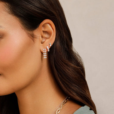 Double Multi Diamond Chain Stud Earring in 14k yellow gold styled on first earring hole of model