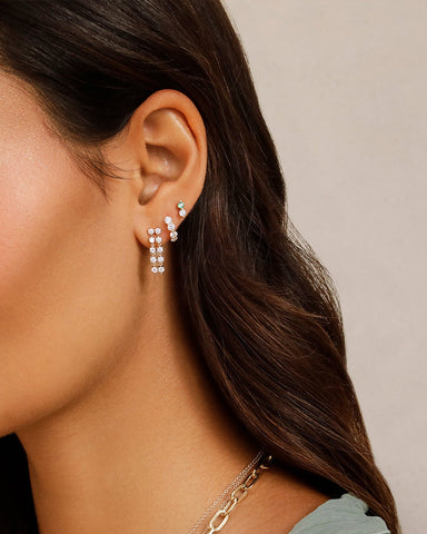 Double Multi Diamond Chain Stud Earring in 14k yellow gold styled on first earring hole of model