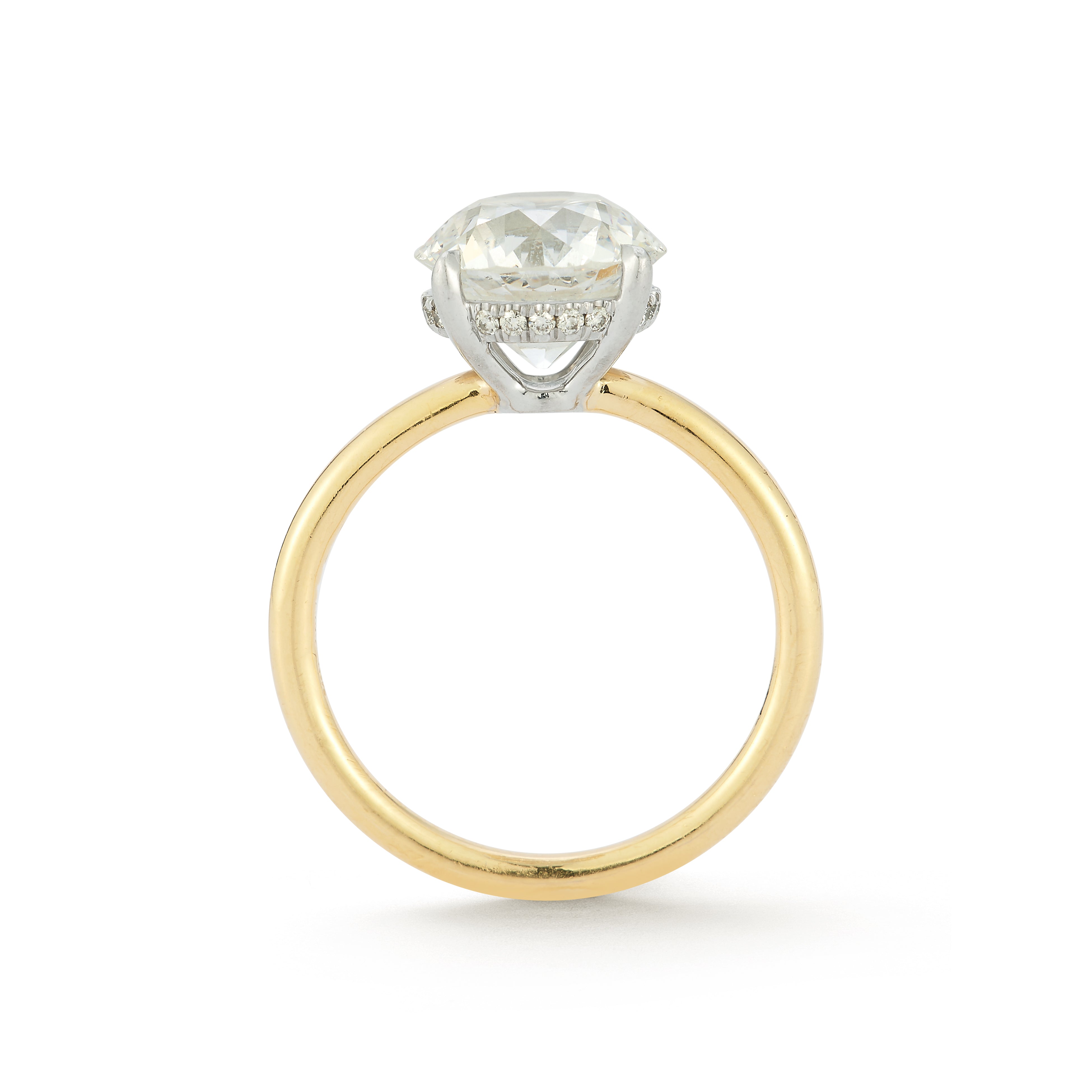 The Jamie Engagement Ring with round center diamond, pave diamonds halo, and yellow gold band