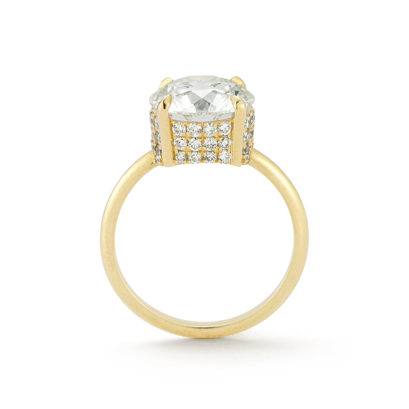The Lindsay Engagement Ring with round center diamond, basket covered in pave diamonds, and yellow gold band
