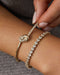 Diamond & Gold Jumbo Love Knot Bangle Bracelet and Endless Love Bracelet in 14k Yellow Gold