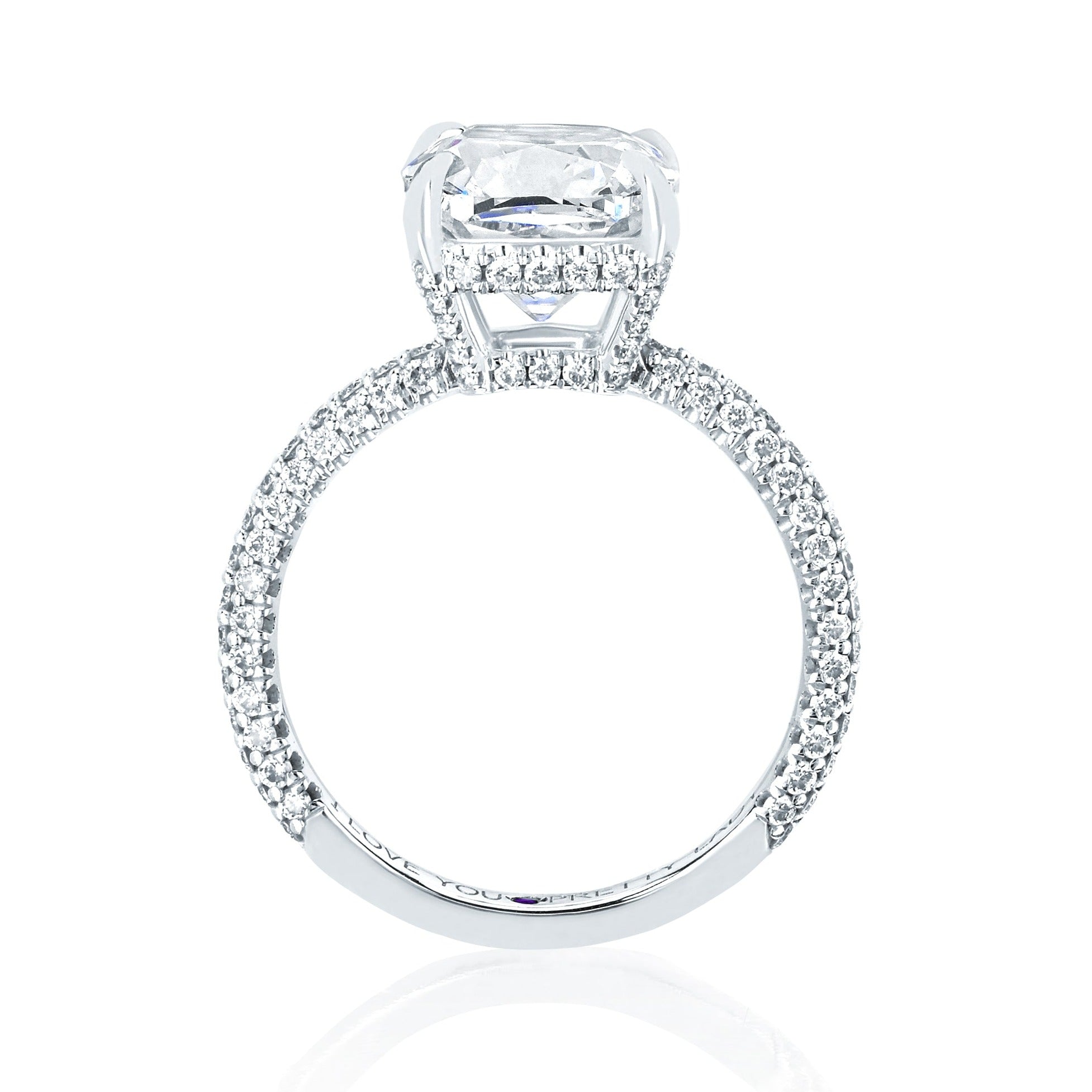 The Emily Engagement Ring with cushion cut center diamond with 3-sided micro pave diamonds on platinum band