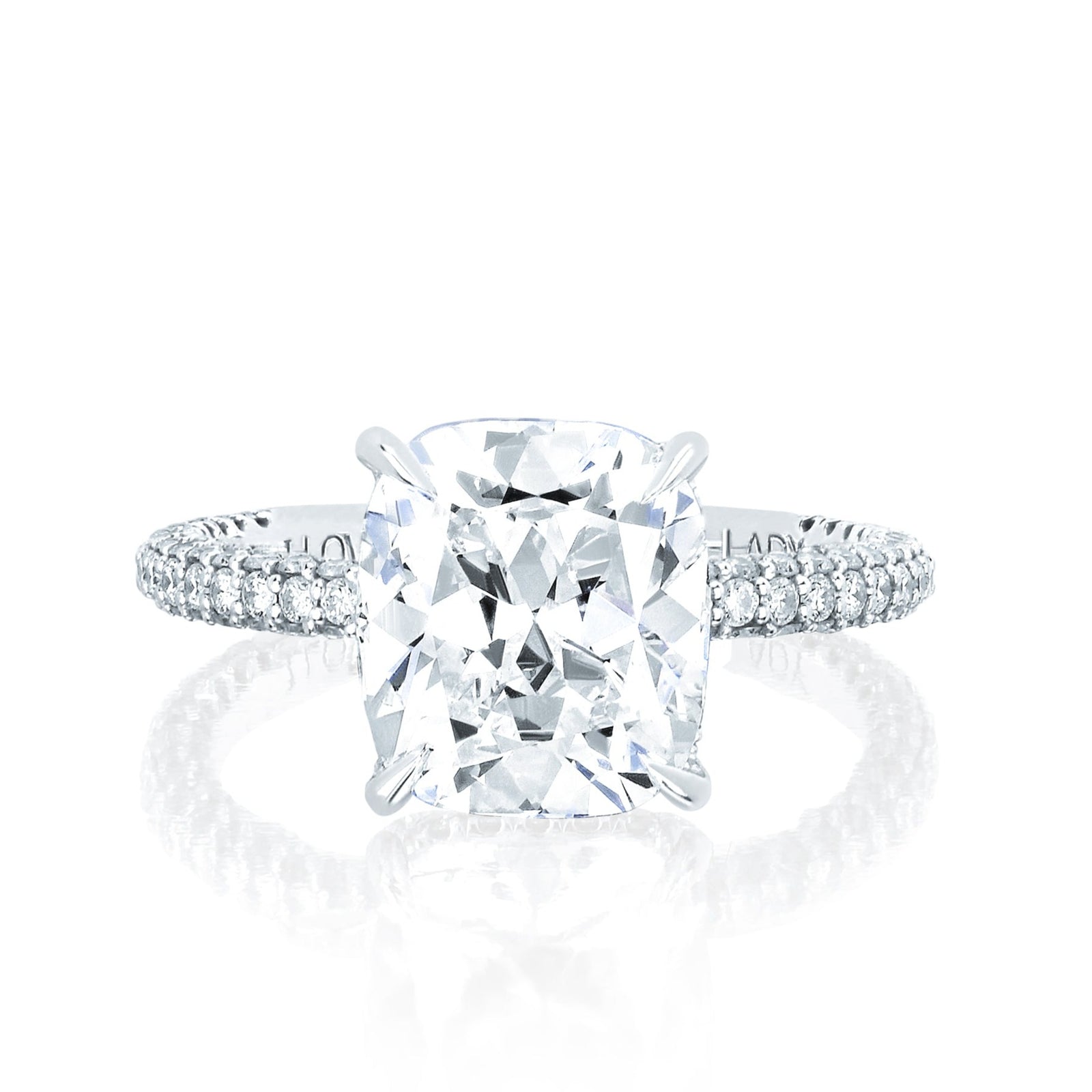 The Emily Engagement Ring with cushion cut center diamond with 3-sided micro pave diamonds on platinum band