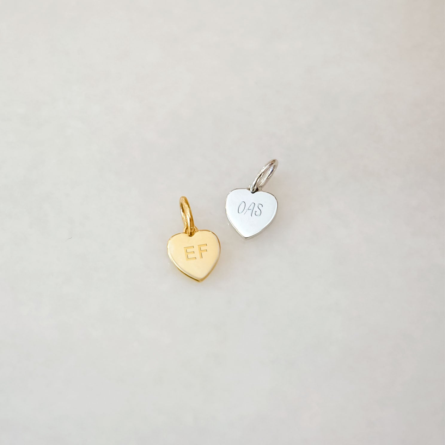 Gold Heart Necklace Charm in yellow gold and white gold engraved with initials EF and OAS