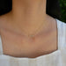 Diamond Hebrew Mom Necklace in 14k yellow gold styled on neck of model