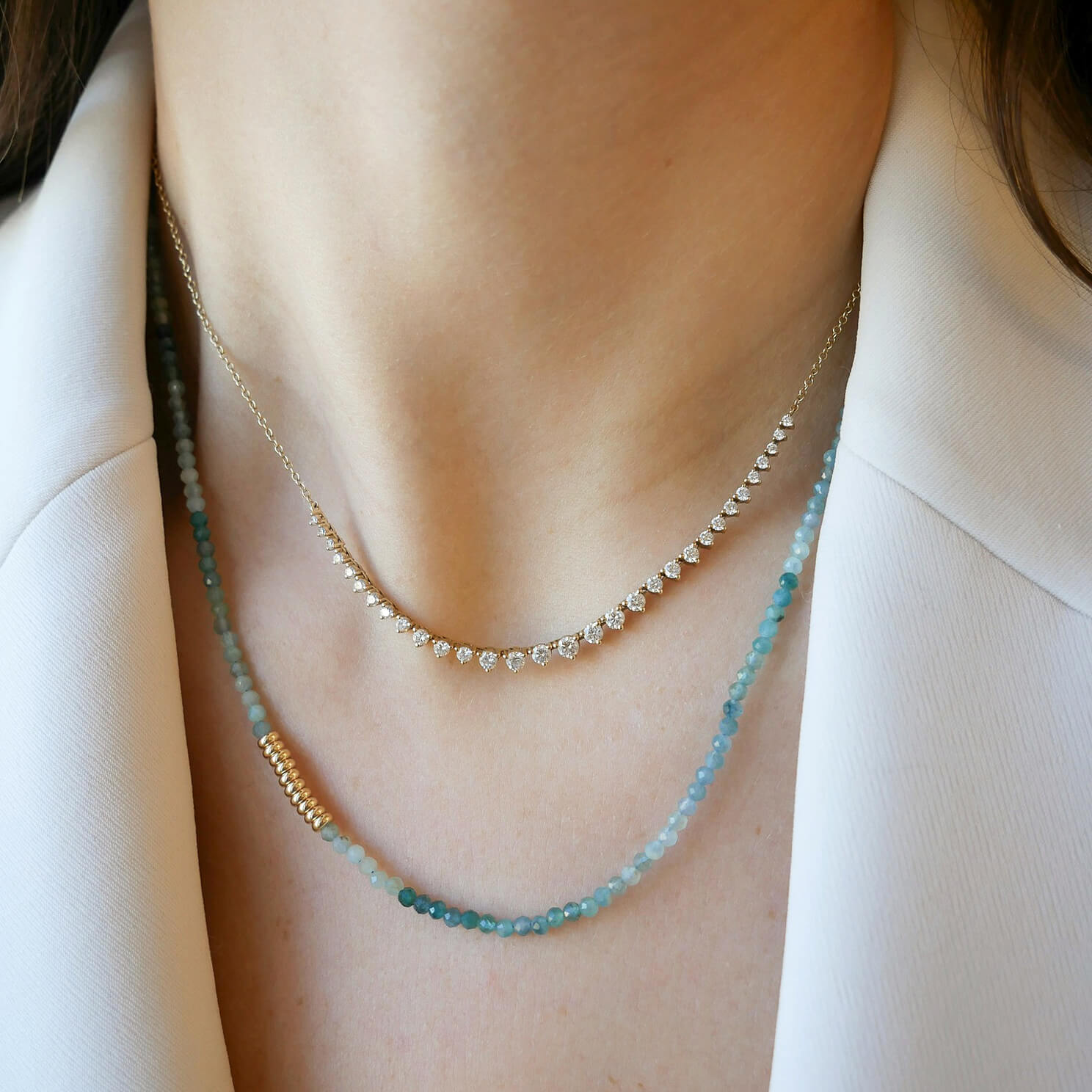 Ombré Tourmaline Birthstone Bead Necklace in 14k yellow gold styled on neck of model with graduated diamond necklace