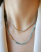 Ombré Tourmaline Birthstone Bead Necklace in 14k yellow gold styled on neck of model with graduated diamond necklace