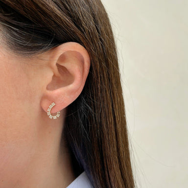 Diamond Double Row Wrap Earring styled on ear lobe of model