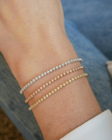 Diamond Segment Mini Link Bracelet in 14k white gold, rose gold, and yellow gold styled on wrist of model