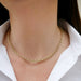 Sienna Chain Necklace in 14k yellow gold styled on neck of model wearing white blouse