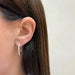 Diamond Double Row Hoop Earring in 14k white gold styled on ear lobe of model