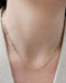 Diamond Segment Mini Link Necklace in 14k yellow gold styled on neck of model