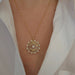 Floating Name & Date Necklace in 14k yellow gold with initials AUSTIN and date 3.10.21 styled on neck of model