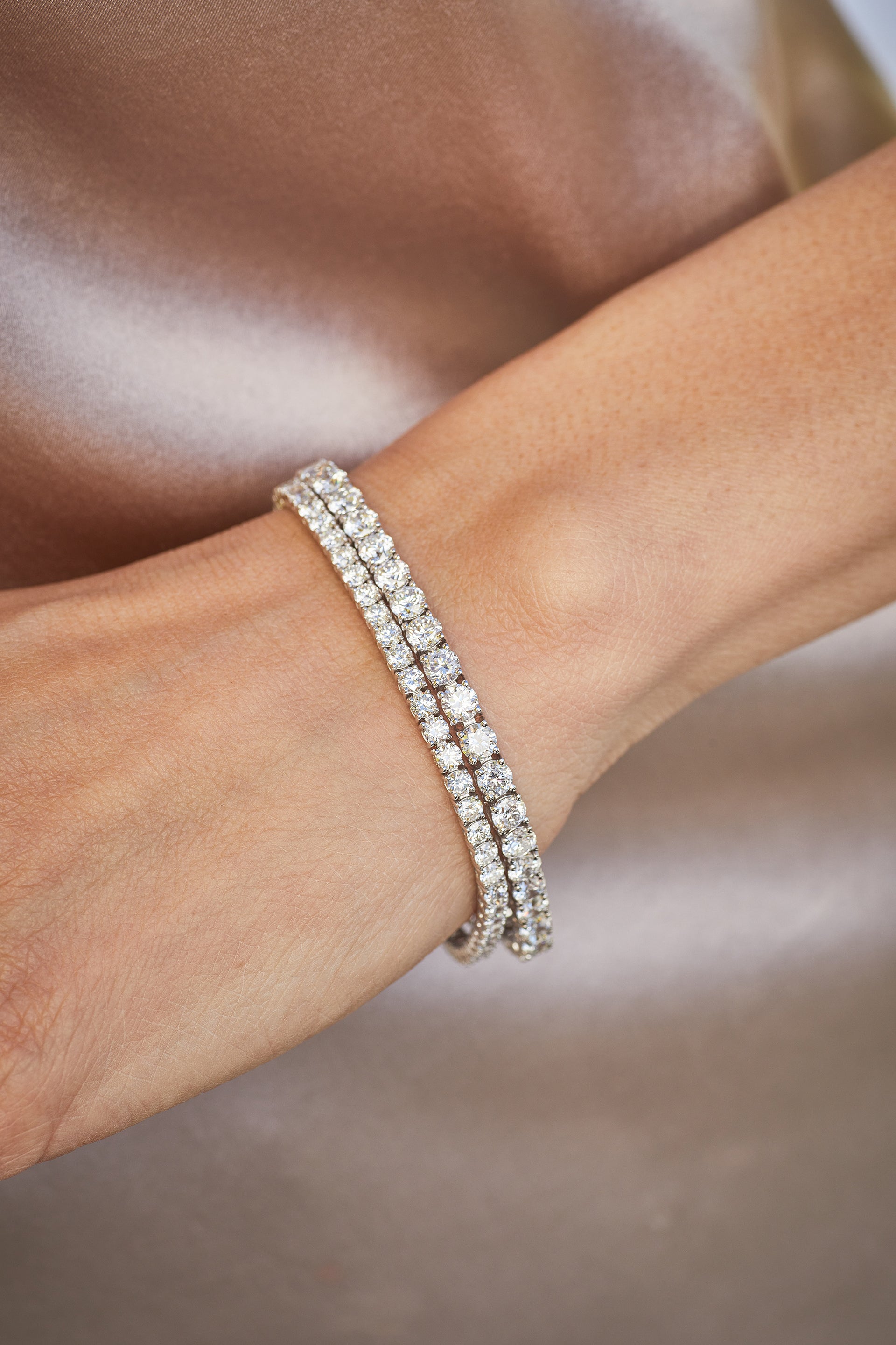 EF Collection diamond tennis bracelets styled on wrist of model