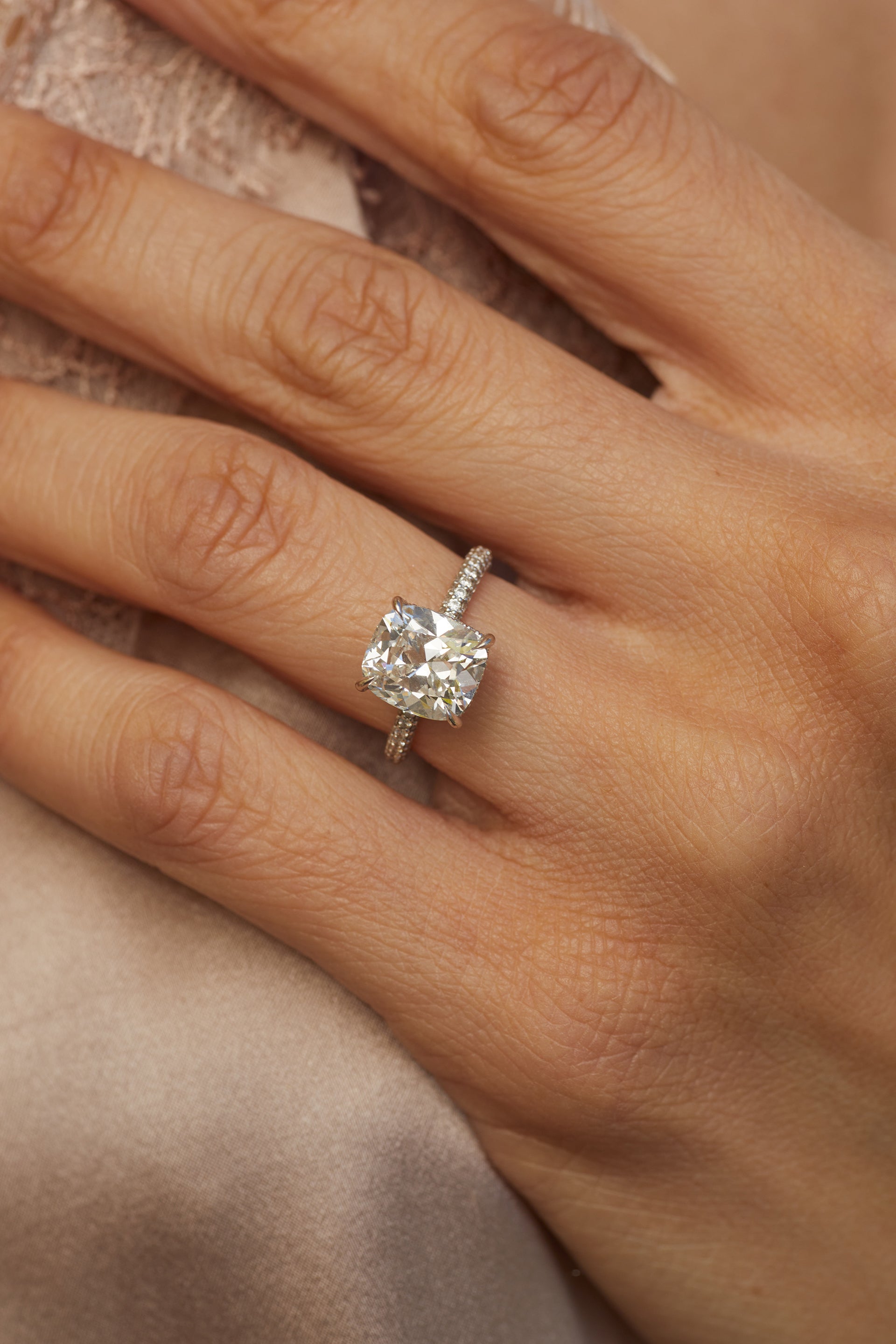 EF Collection Emily engagement diamond ring styled on ring finger of model