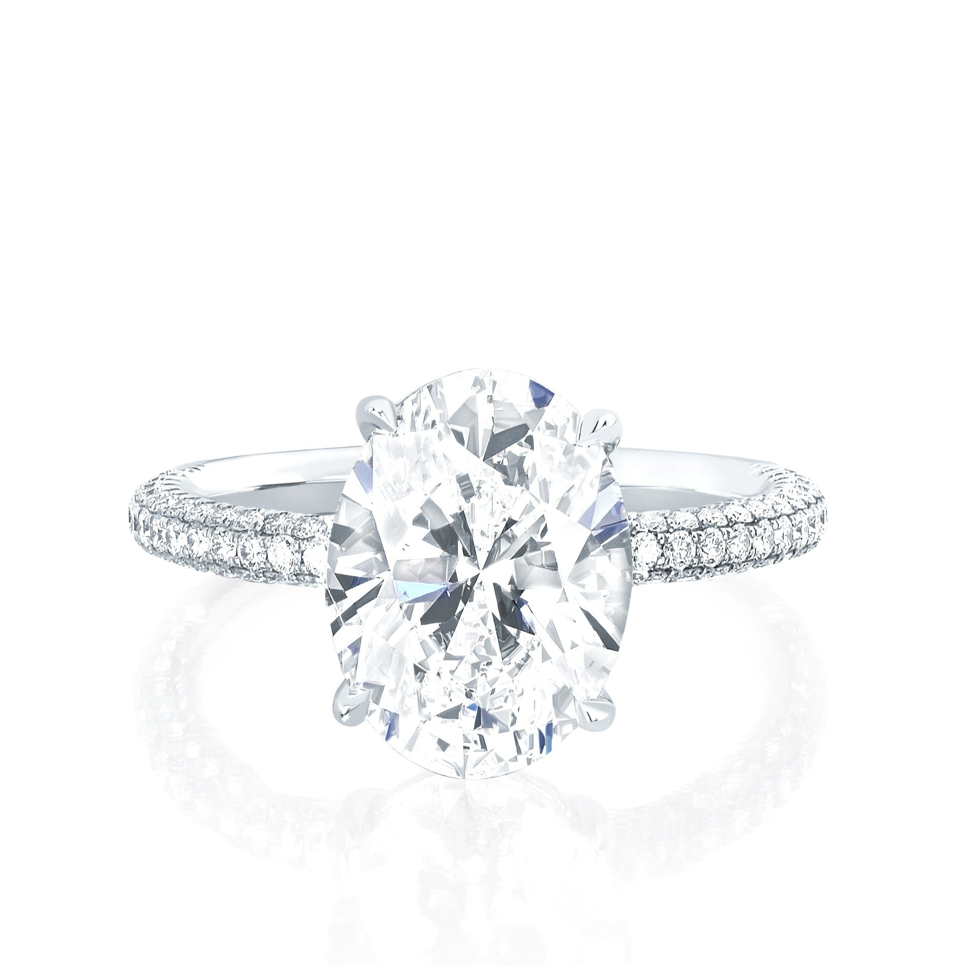 The Emily Engagement Ring with oval cut center diamond with 3-sided micro pave diamonds on platinum band