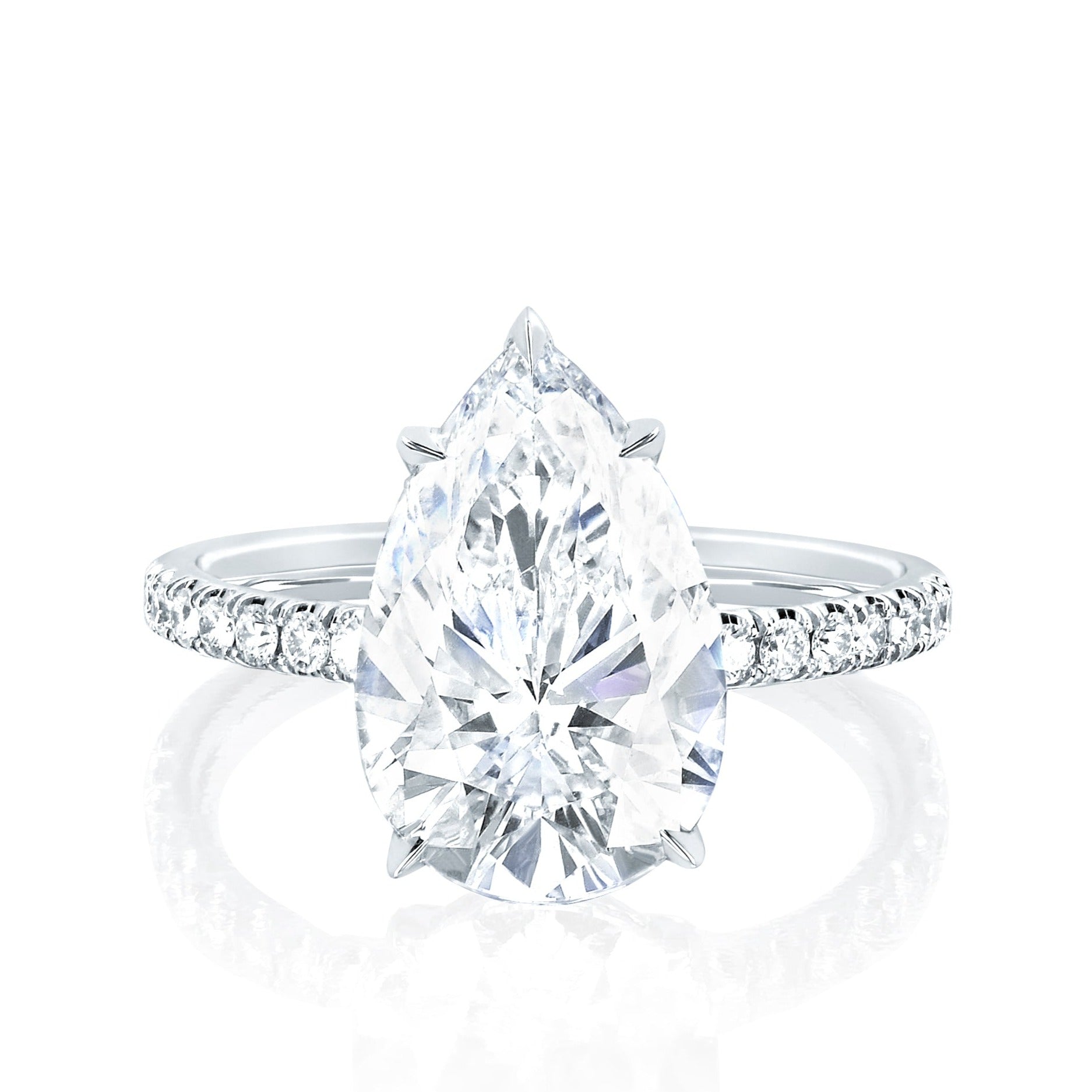 The Jessica Engagement Ring with pear shaped center diamond and micro pave diamonds on platinum gold band