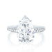 The Jessica Engagement Ring with pear shaped center diamond and micro pave diamonds on platinum gold band