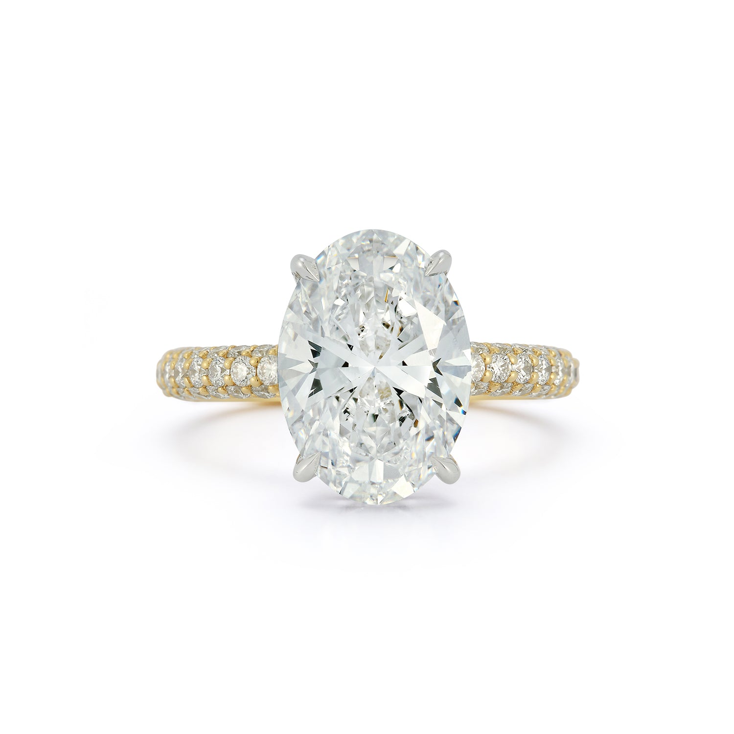 The Emily Engagement Ring with oval cut center diamond with 3-sided micro pave diamonds on yellow gold band