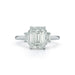 The Lauren Engagement Ring with emerald cut center stone and emerald cut stones on either side with platinum band