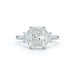 The Lauren Engagement Ring with cushion cut center stone and cushion cut stones on either side with platinum band