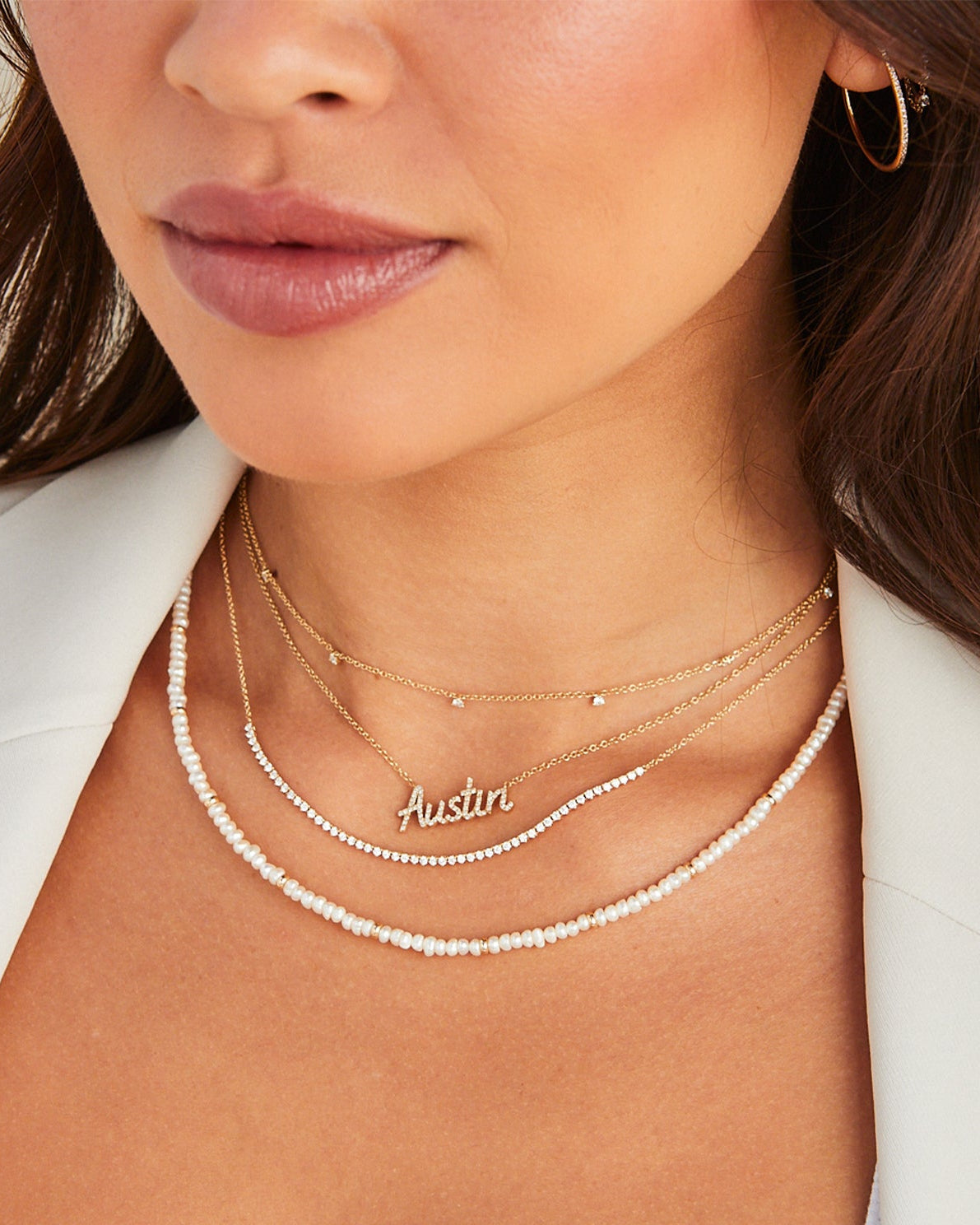 7 Prong Set Diamond Necklace styled on neck of model with diamond necklaces