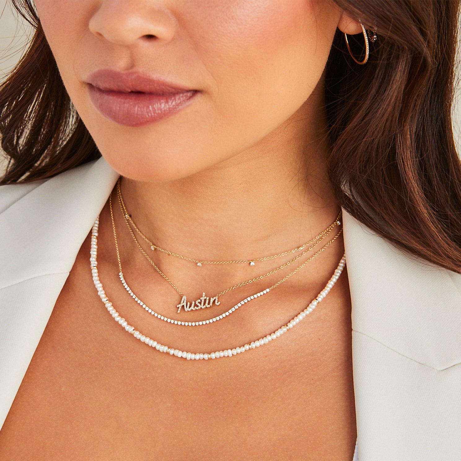 7 Prong Set Diamond Necklace styled on neck of model with diamond necklaces