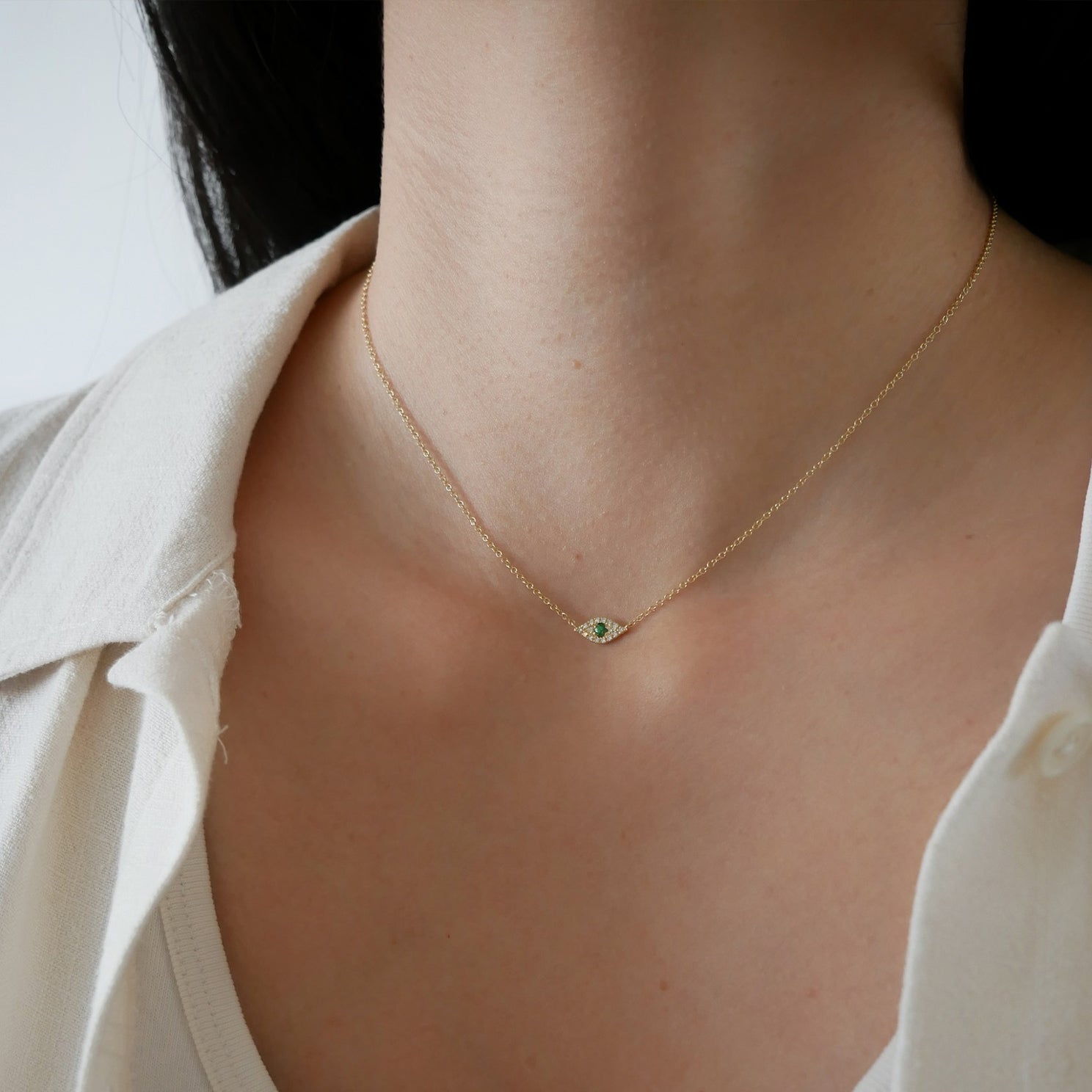 Diamond Tsavorite Evil Eye Choker Necklace styled on neck of model