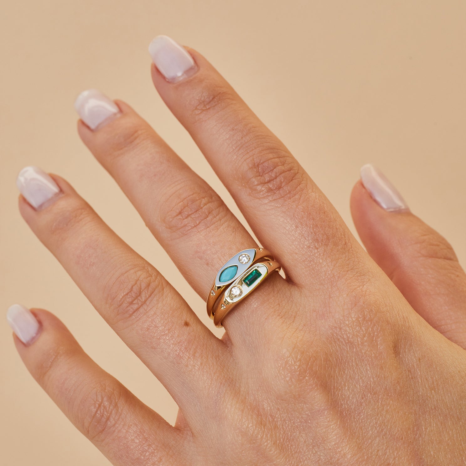 The Seaside Treasure Gift Set in 14k yellow gold styled on middle finger of model