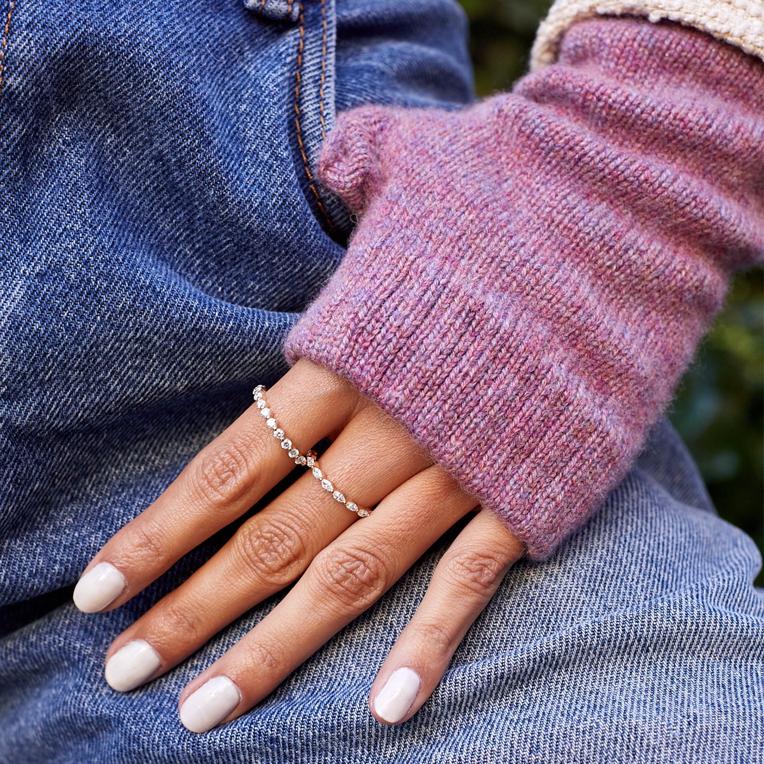 Mauve Cashmere Wrist Warmer styled on wrist of model with diamond rings styled on fingers