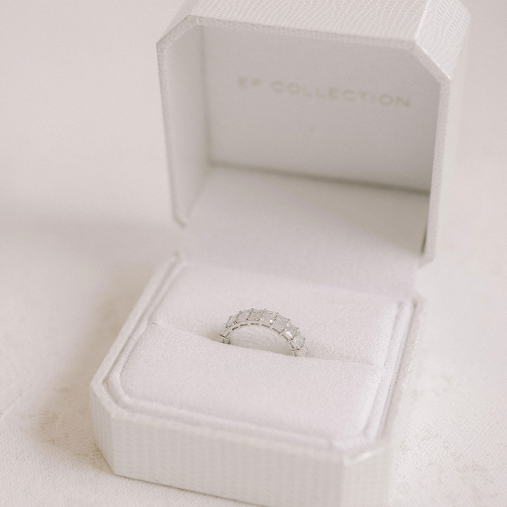 EF Collection diamond eternity wedding band ring with emerald cut diamonds in white ring box